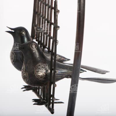 مجسمه فولادی‏‏ نقره کوب‏ سایز ‏32‏cm‏ رنگ ‏ خاکستری تیره‏ طرح ‏دو پرنده‏ 